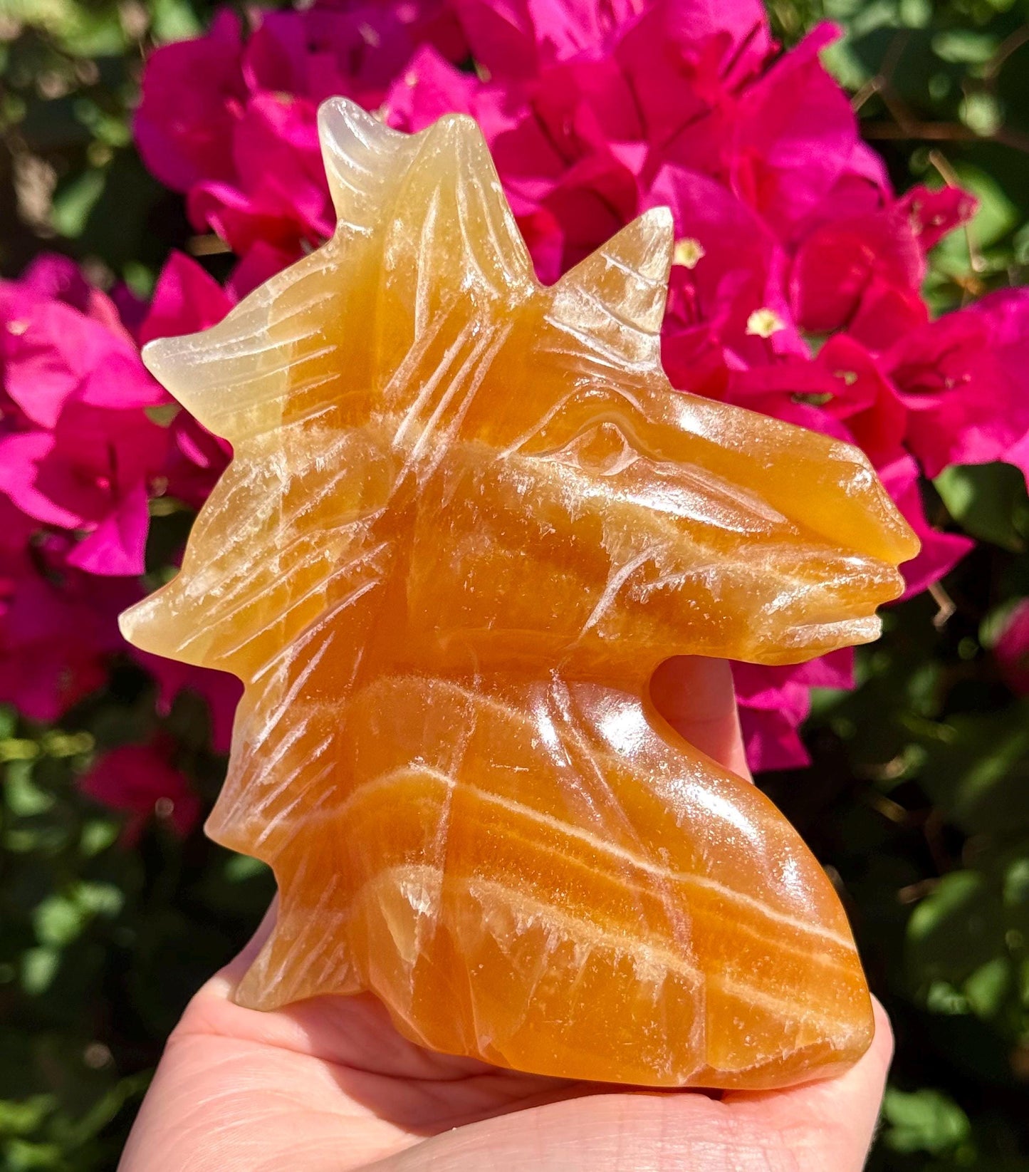 Big Juicy Orange Calcite Unicorn Head 4”