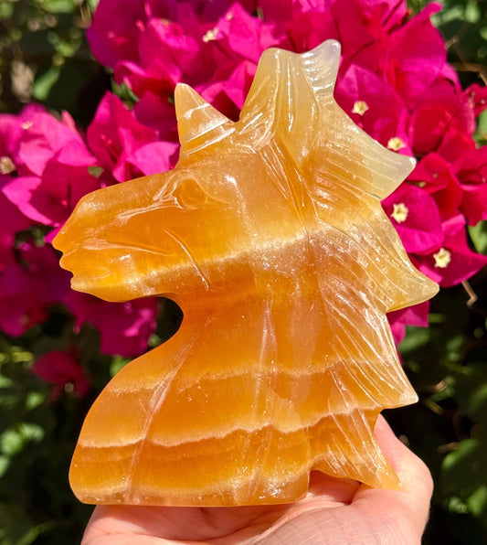 Big Juicy Orange Calcite Unicorn Head 4”