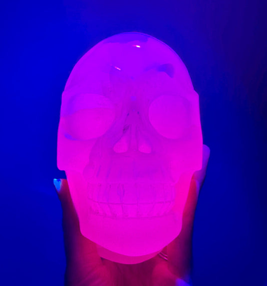 Bright UV Reactive Mangano Calcite Skull With Spine