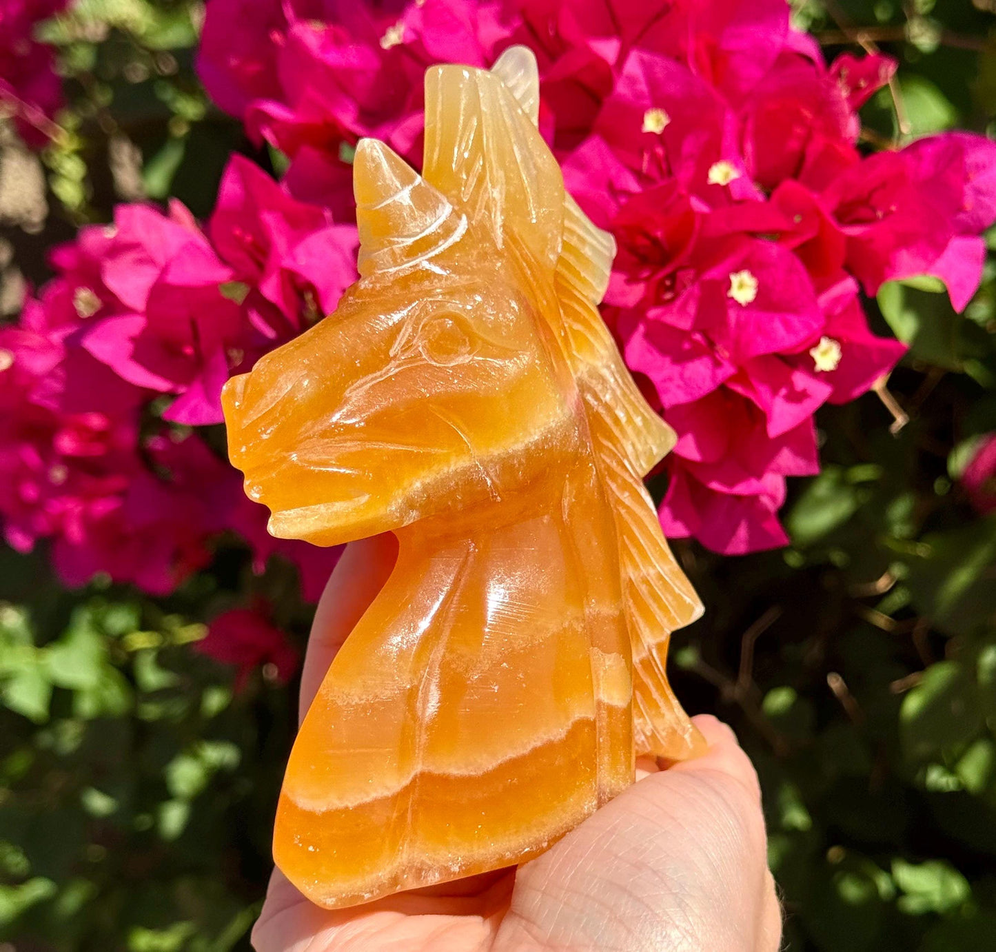 Big Juicy Orange Calcite Unicorn Head 4”